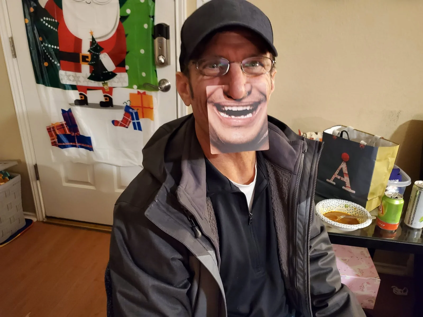 Larry laughing with a novelty oversized smile