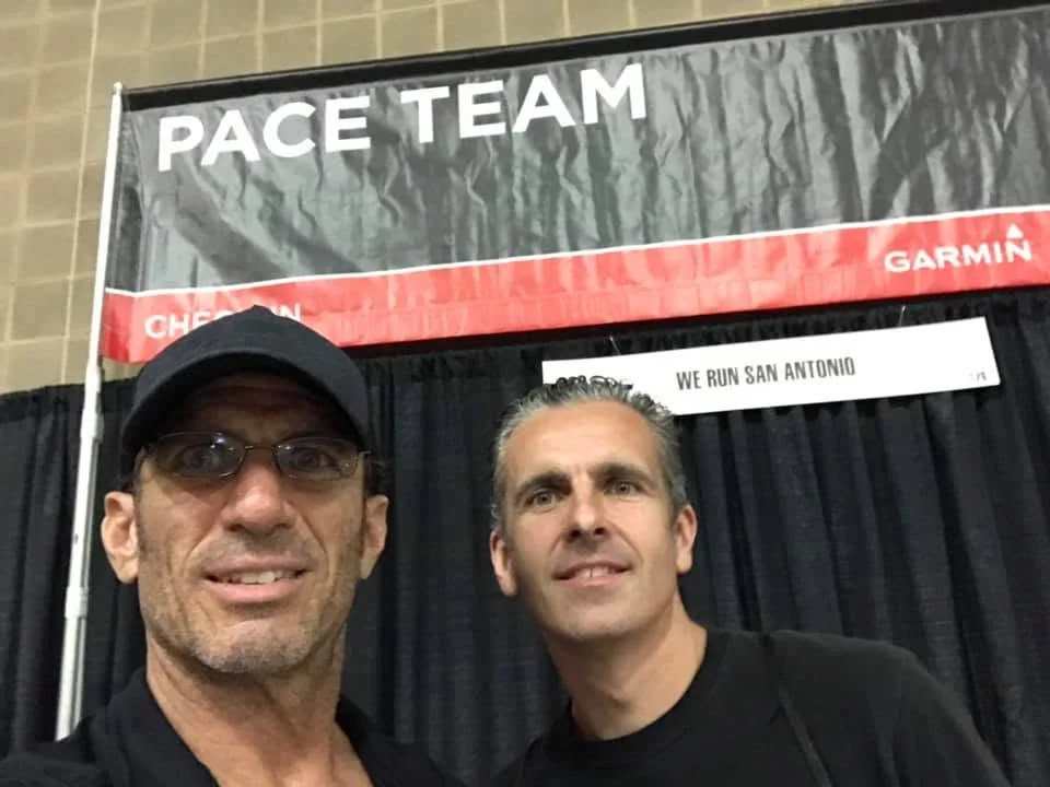 Larry and Jim in front of a pace team banner