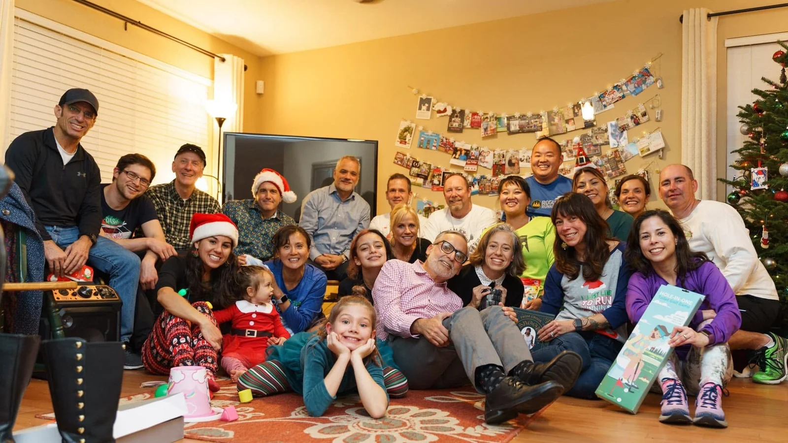 Larry with the Sparks and their families gathered indoors